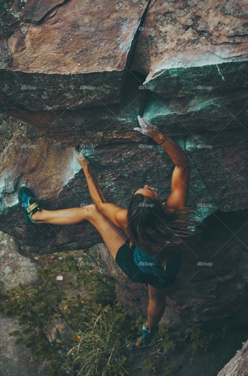 |photo of woman climbing mountain|