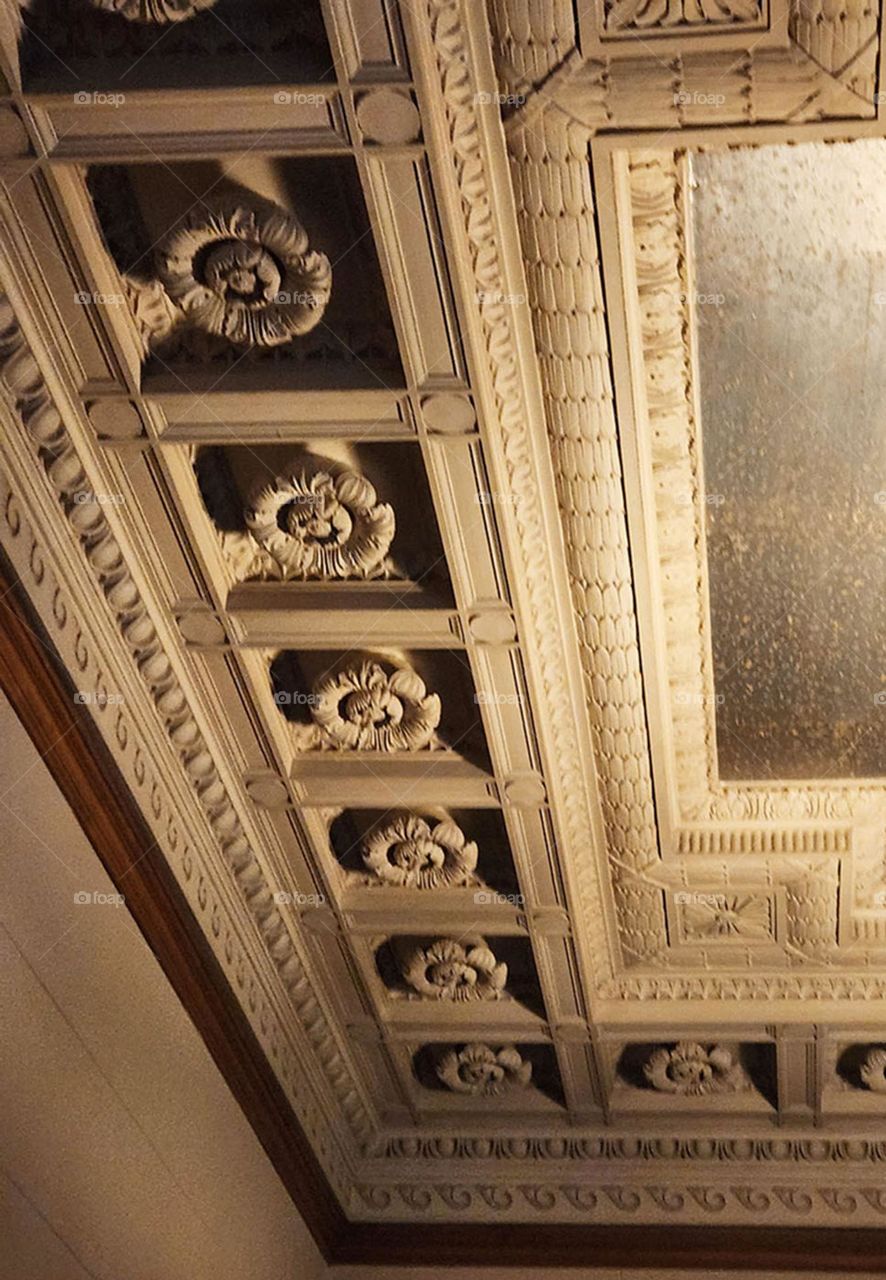 From the moment a person enters The historic Pittock Mansion in Oregon, there are ornate carvings to be seen above and below