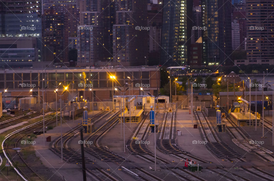 Train station in front of New York skyscrapers. View from the bridge