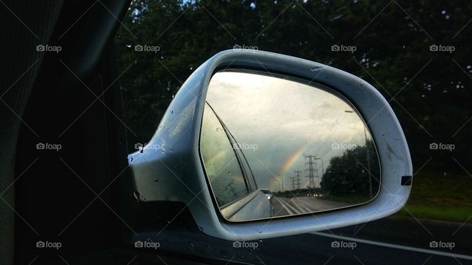 Rainbow from car side view mirror