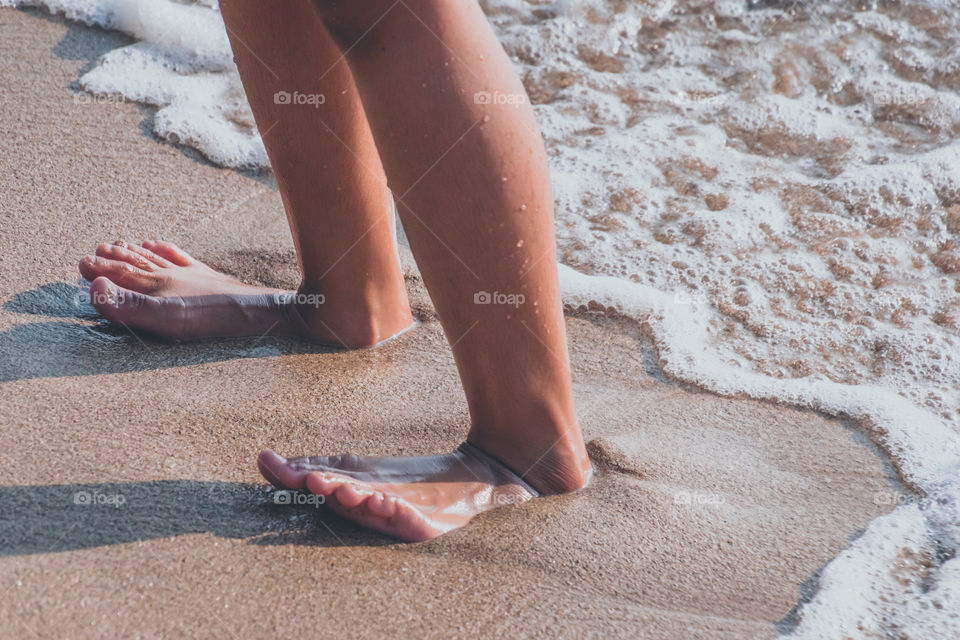 The feeling when you stand on a wet beach sand, hit by a soft sea wave, and hear the sound of a wave, he knows the summer is here