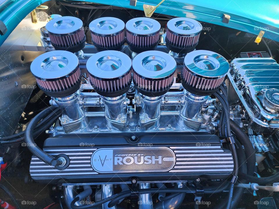 A crate motor producing substantial torque and horsepower is installed in a Shelby Cobra replica