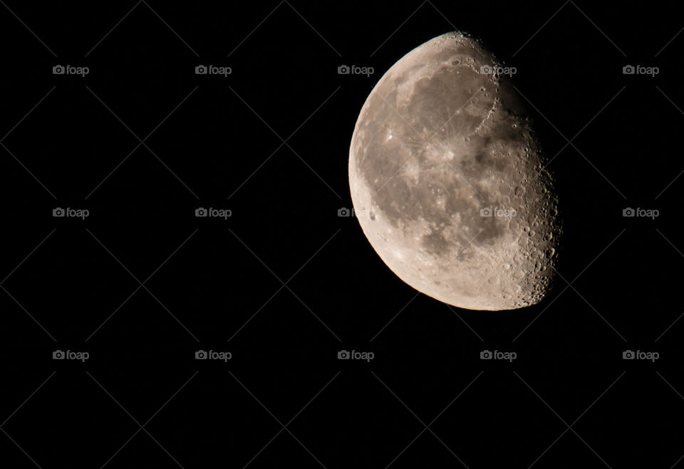 Low angle view of moon in sky at night