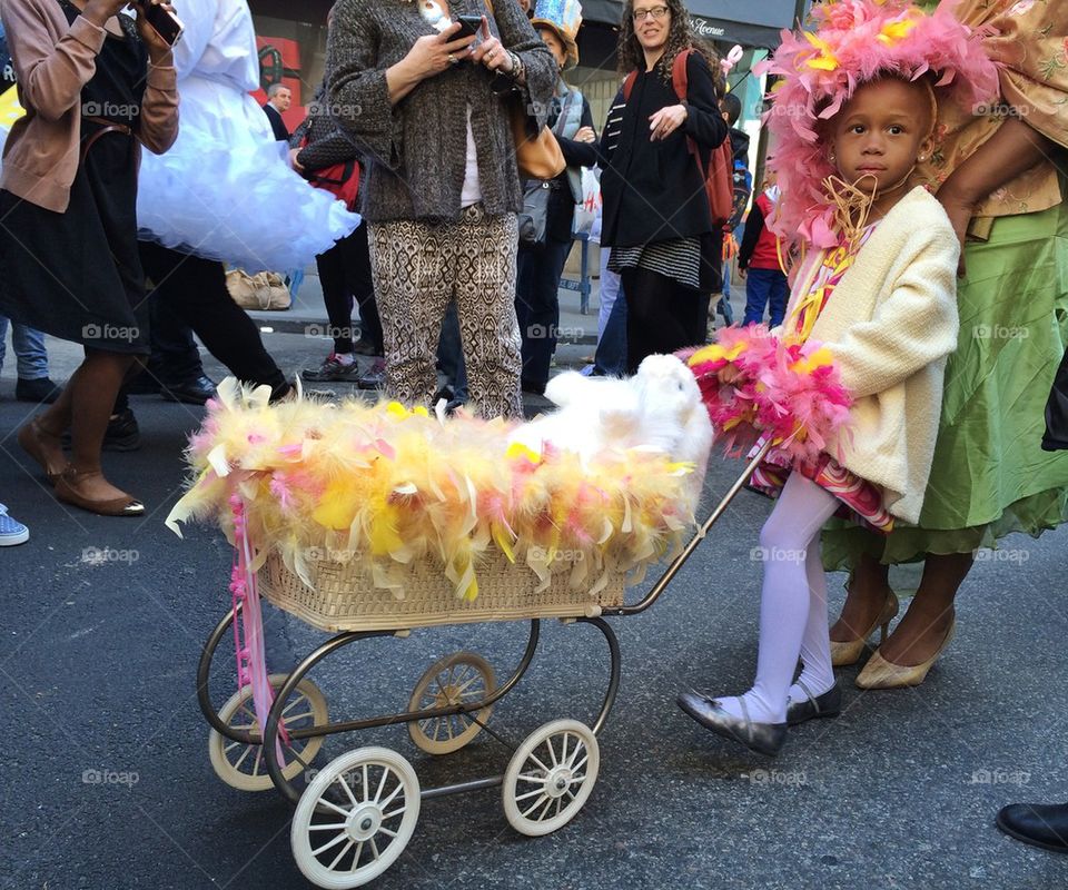 Little girl and pram