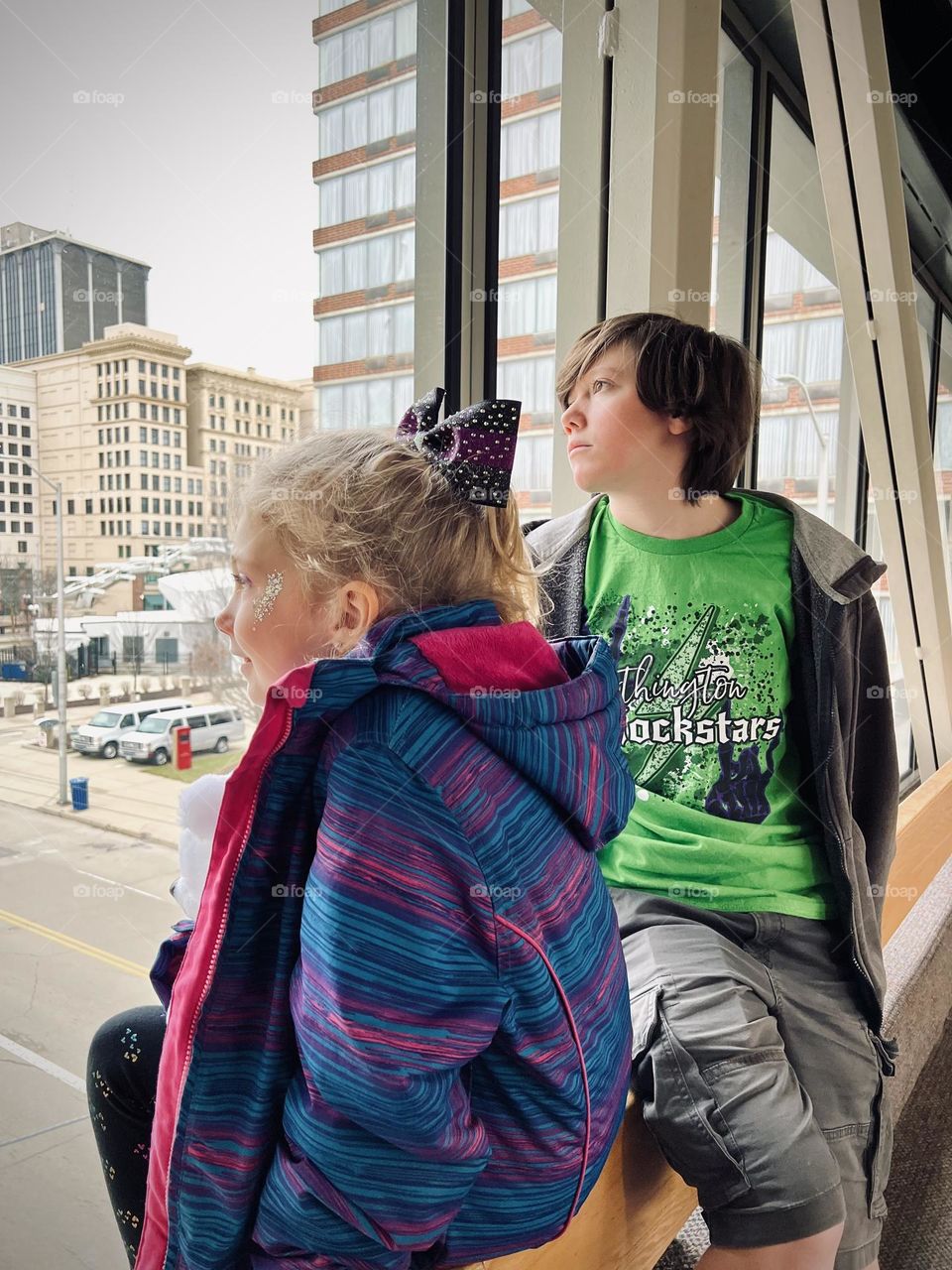 My kiddos looking out at downtown Dayton Ohio