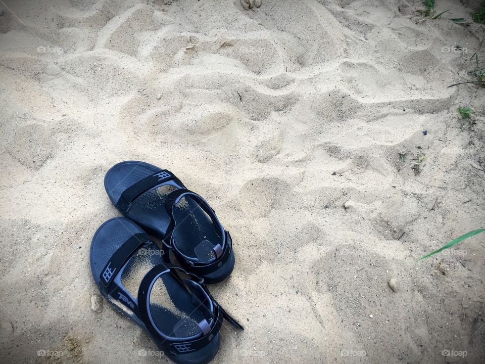 Sandals in Sand. Sandals in the sand.