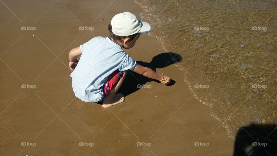 Boy in the beach. Boy in the beach at autum in uruguay
