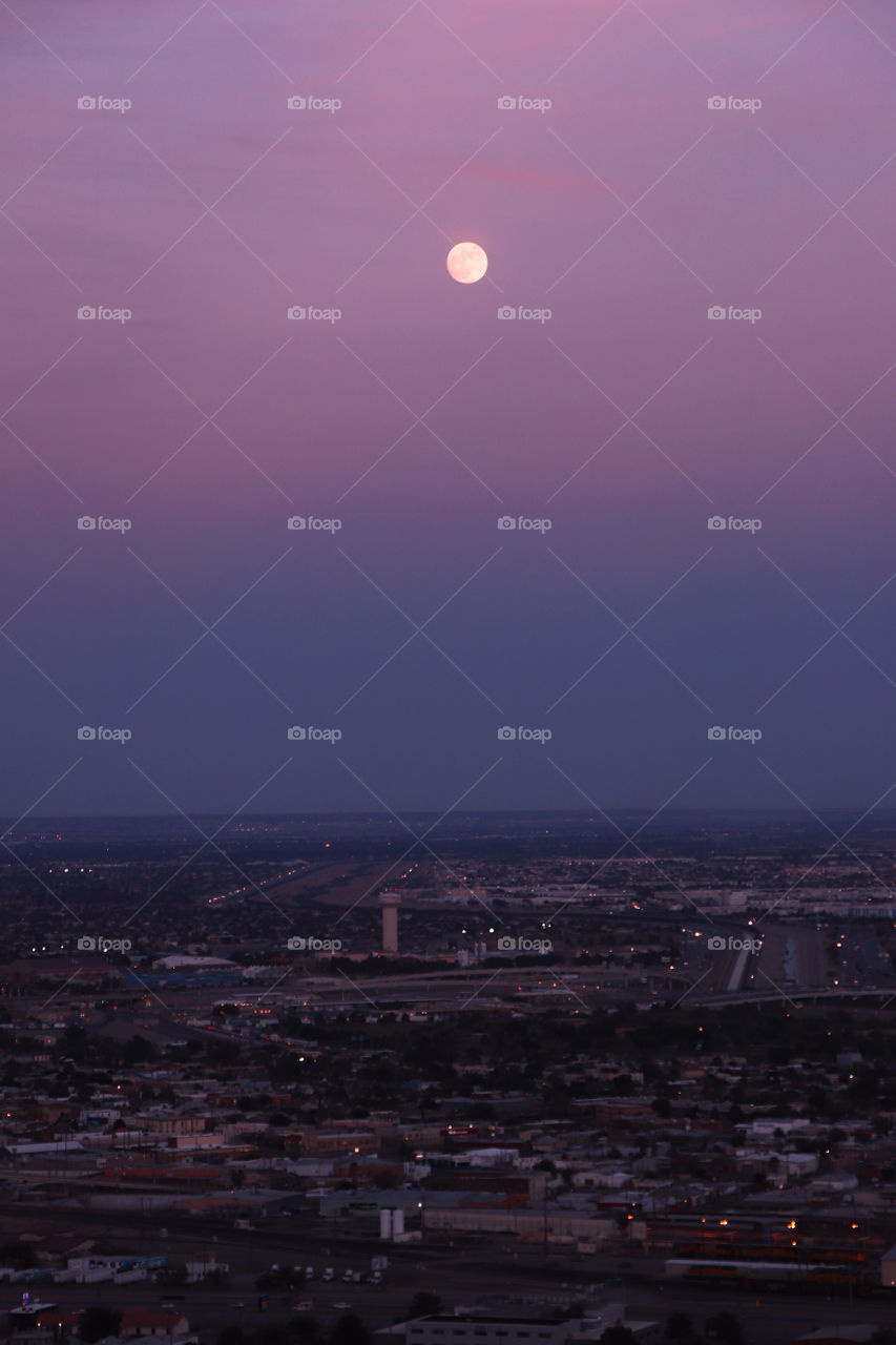 Moon during sunset over El Paso