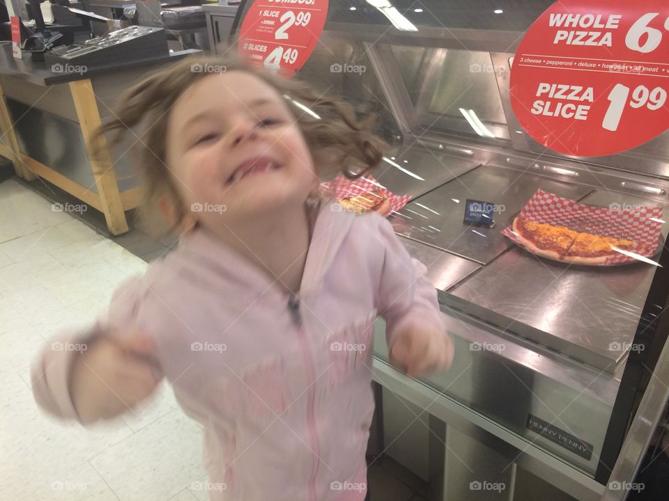I want pizza.  Excited girl jumping up and down for pizza 
