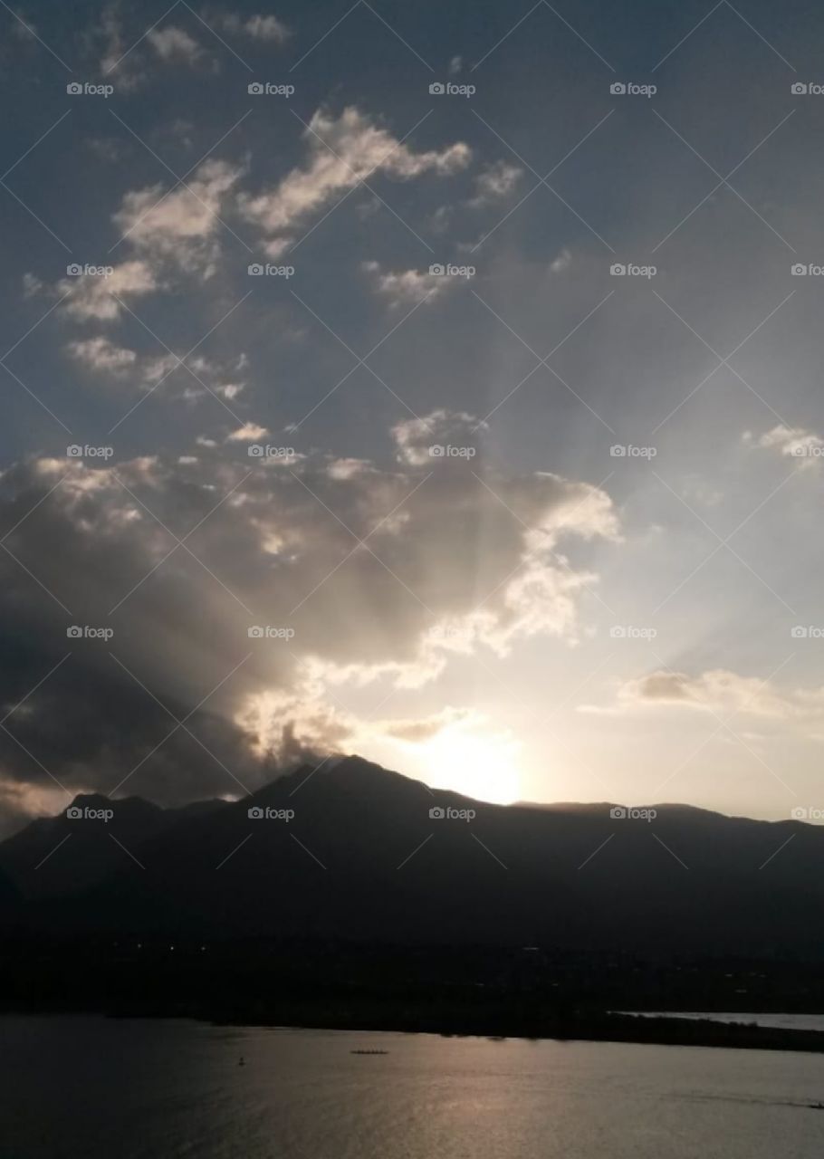 Sunset in the mountains by a lake