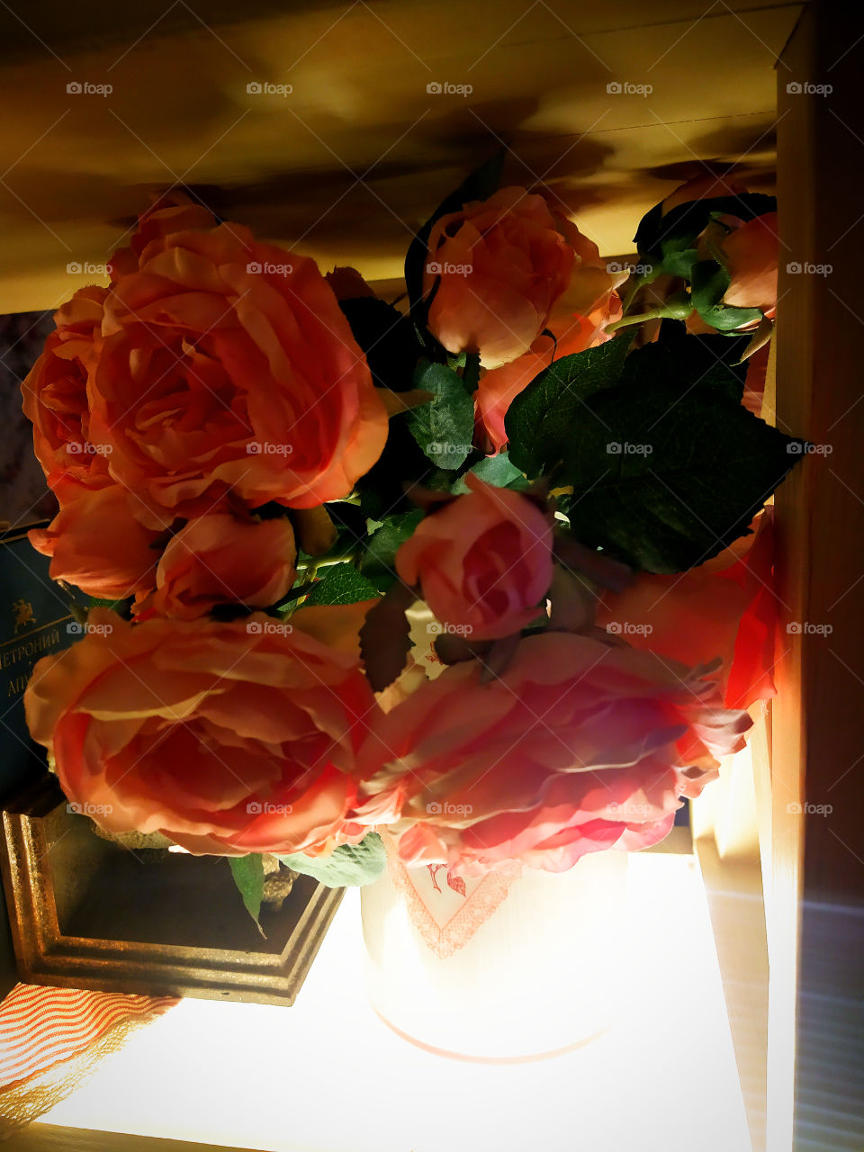 Bouquet of red roses in a transparent jar