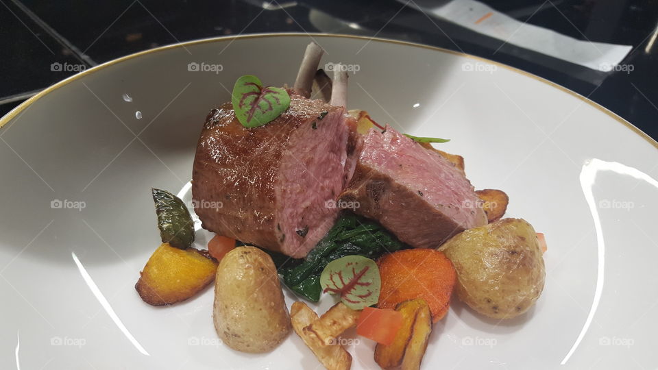 Lamb with oven potatoes and winter vegetables