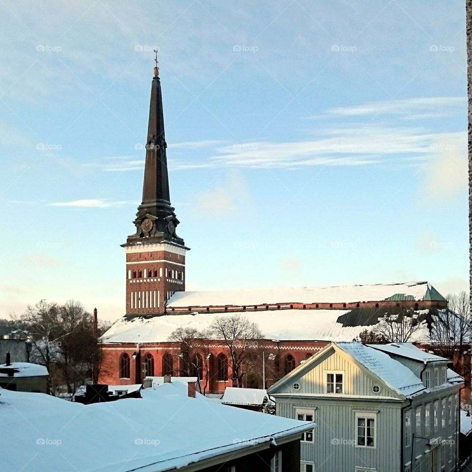 Cathedral in winter coat. Västerås cathedral from above at winter