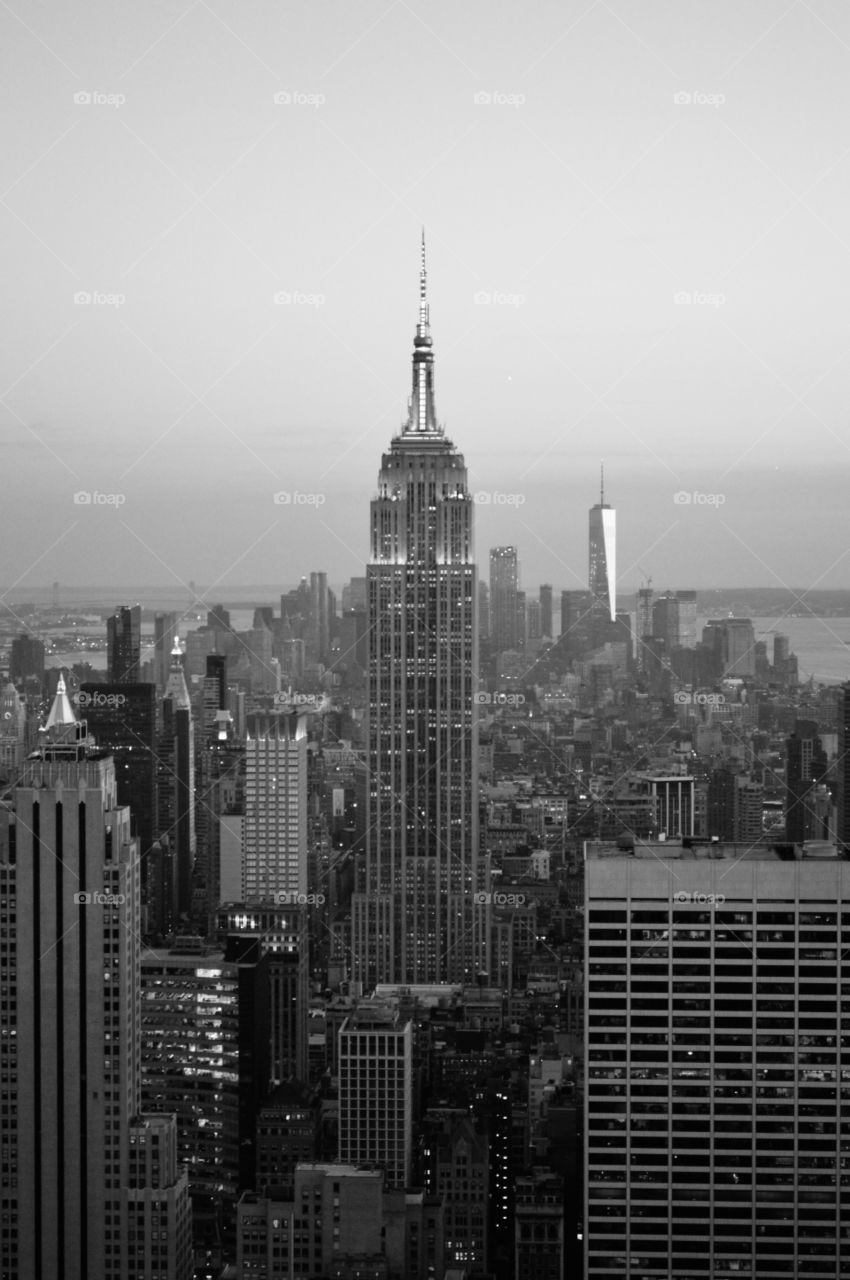 The Empire State Building is a 102-story, black and white architecture. 5th tallest skyscraper, skyscrapers, concrete jungle