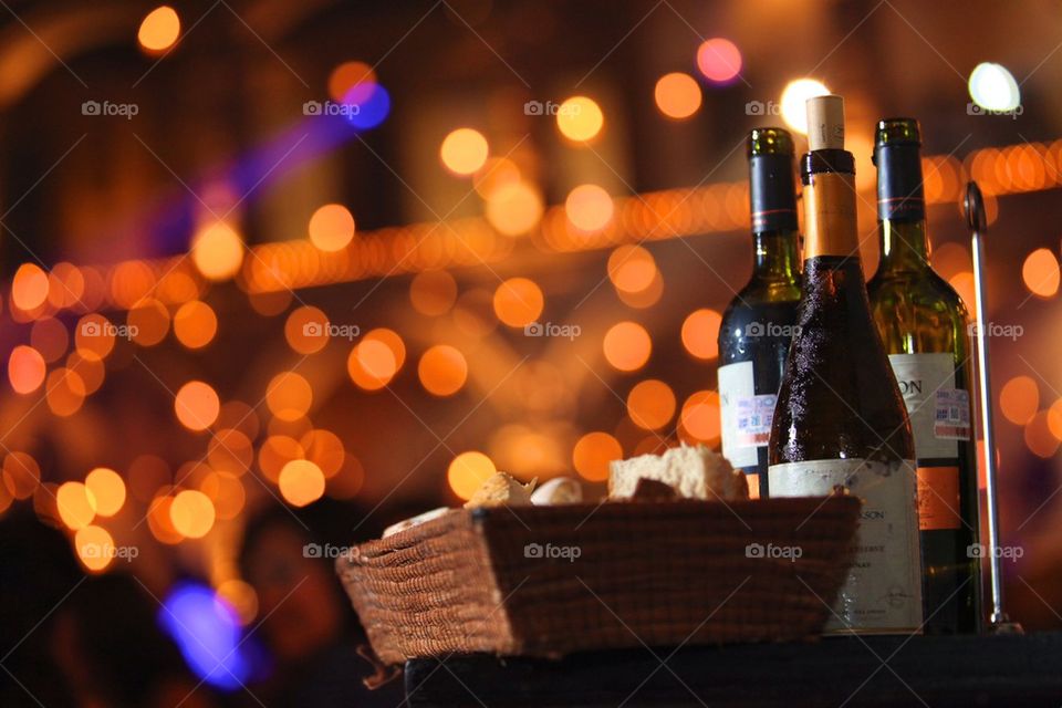 Wine, bread and cheese in a basket