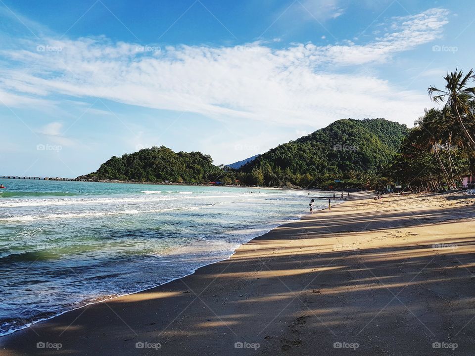 Scenic view of beach against mountain