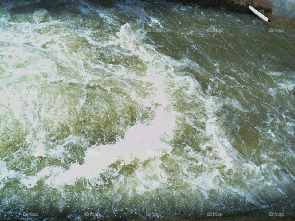 heavy and fast flow of river water