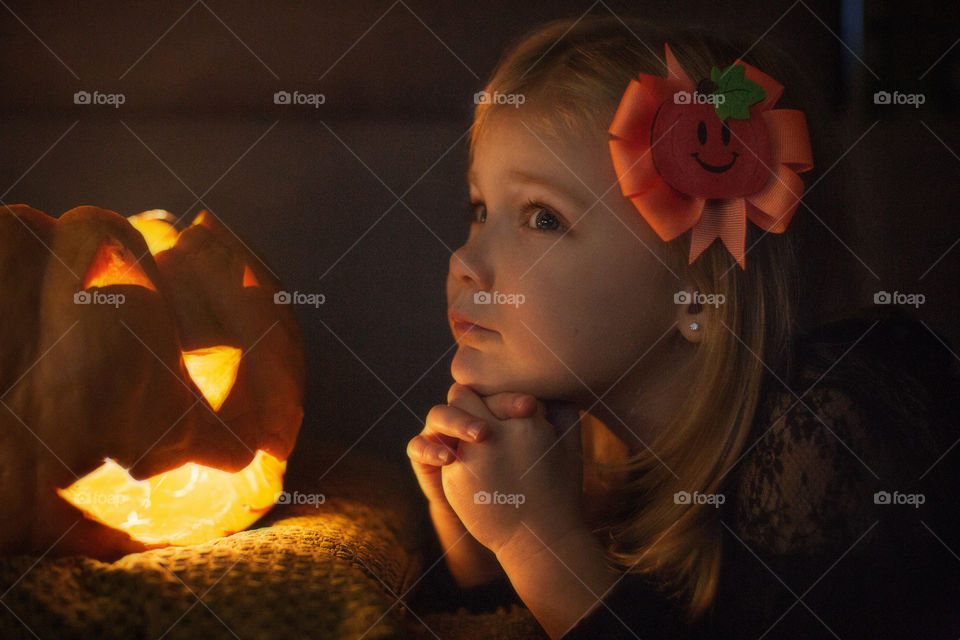girl and pumpkin