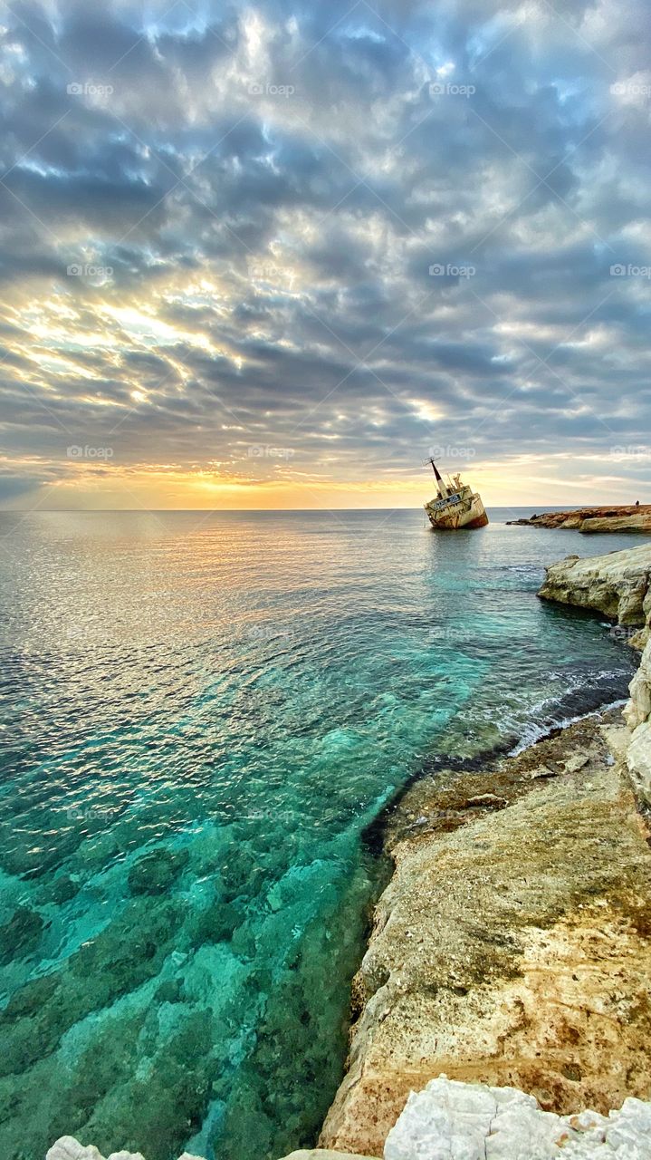 A shipwreck in Paphos , Cyprus. A beautiful place where someone can enjoy amazing sunsets. When the sea is calm, the colors of the water are great! Visit this place but please, don’t forget to show respect for the environment!