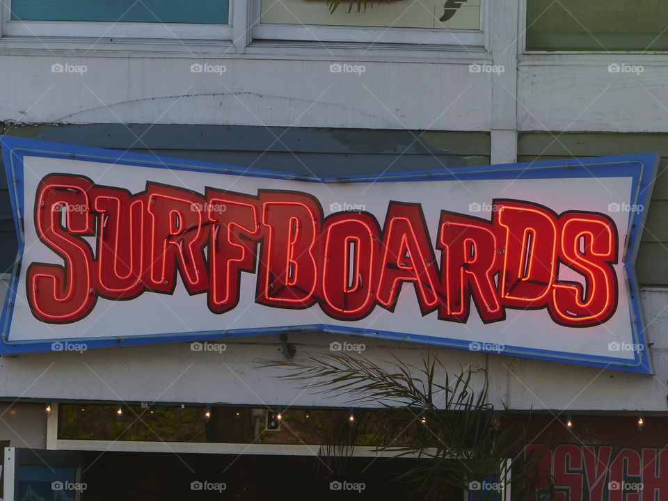 Surfboards red neon sign 