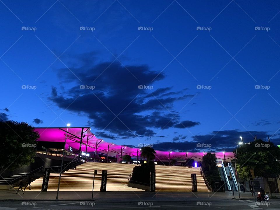 Cloudy sky in the evening, modern building in Barcelona, Spain 