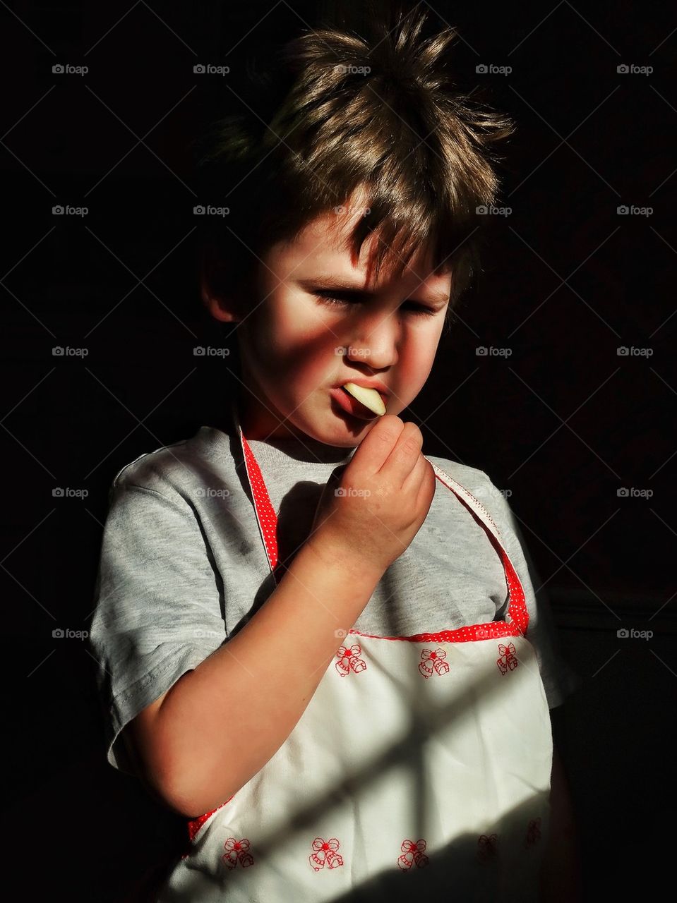 Boy Eating A Snack