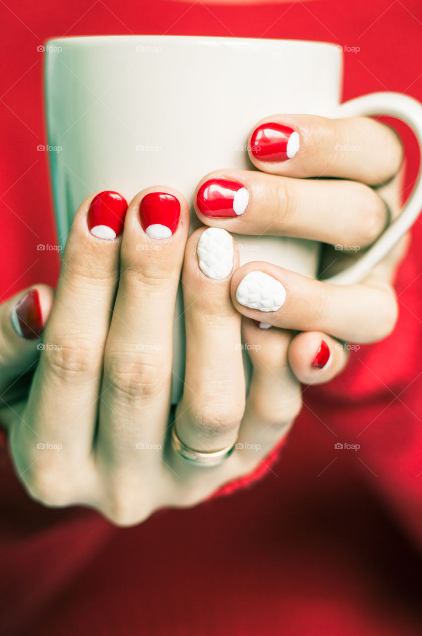 woman hand with cup of tea