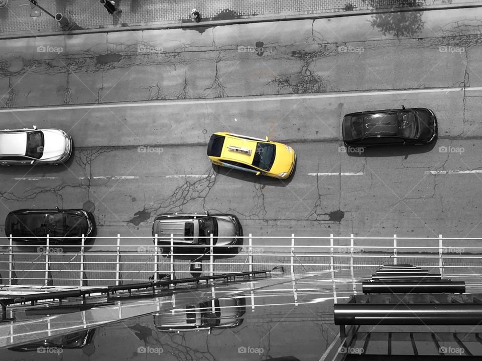 Black and white with a Pop of colour, 11th floor looking balcony looking down at traffic from a hotel room in the ‘Sheridan on the Falls’ (falls side) *Niagara Falls, Ontario, Canada in May 2-4 weekend 2018