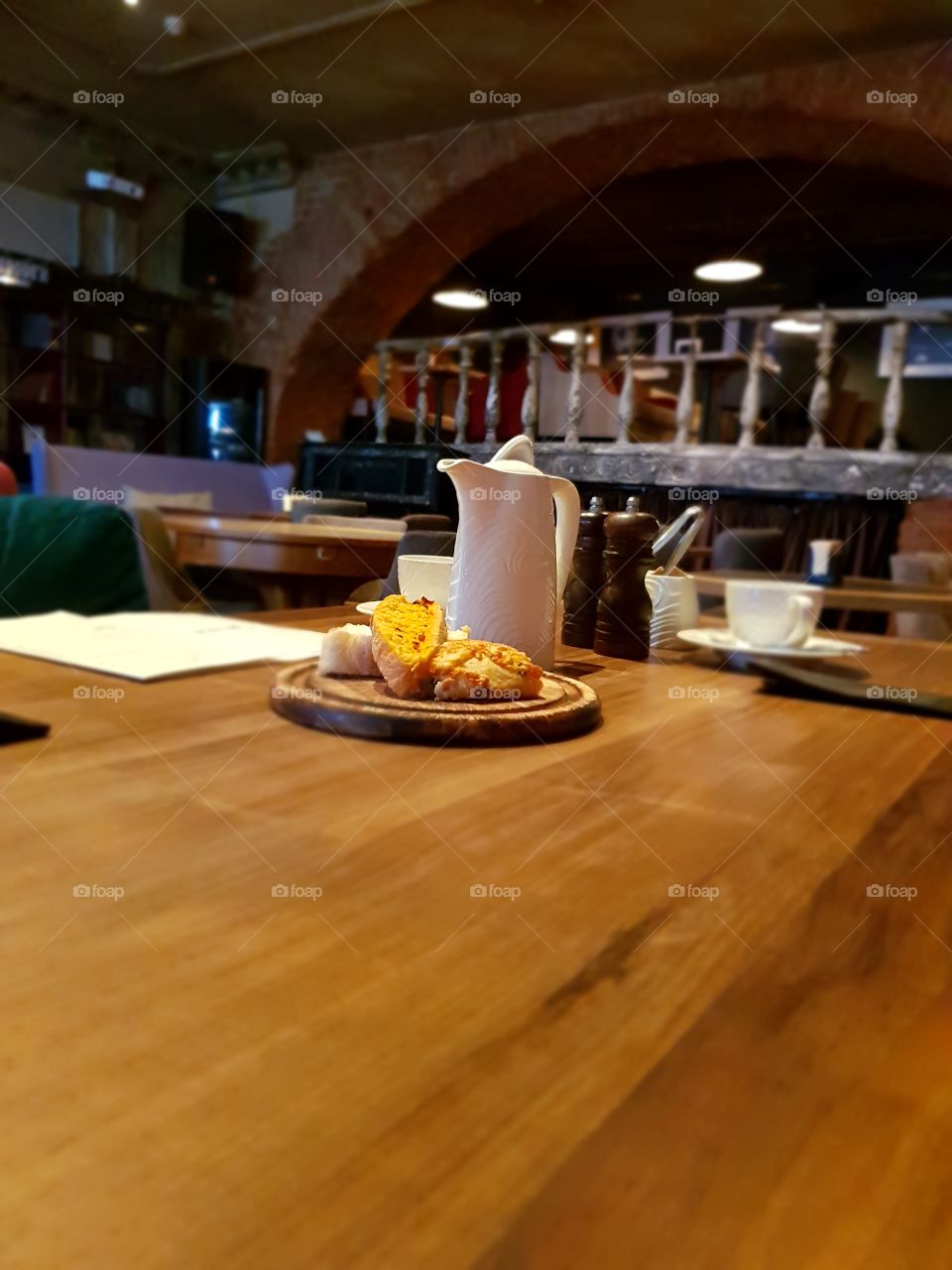 Bread and tea at the table in cafe