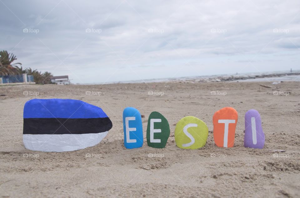 Eesti, Estonia and national flag souvenir on stones