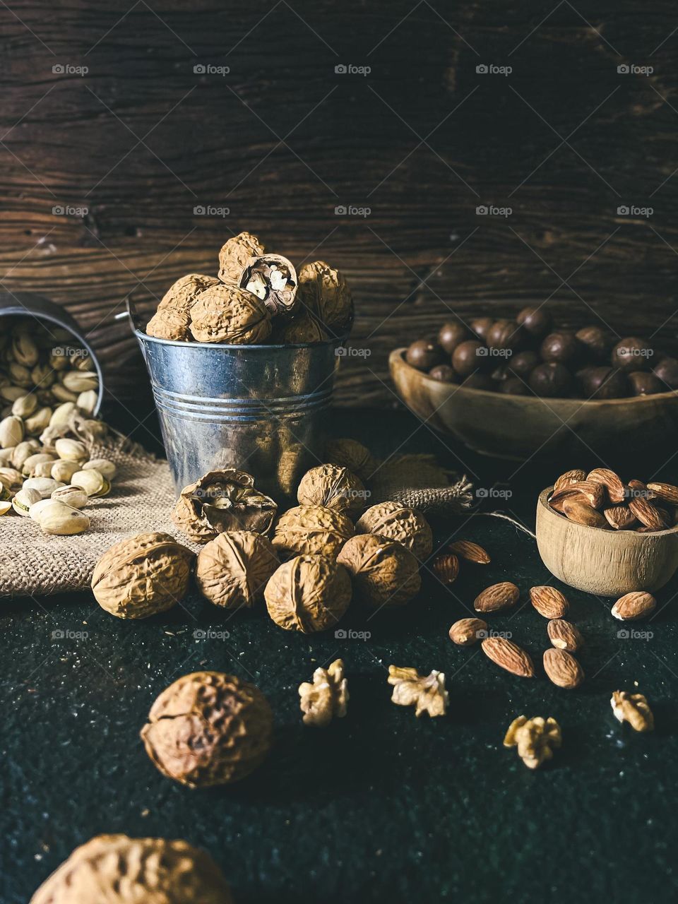 Variation of nuts in close up view with dark background 