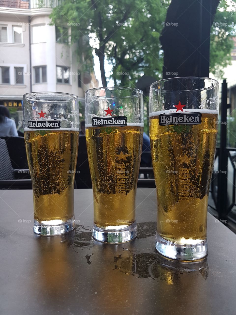 haineken bear in a glass on the table