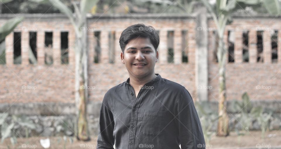 Natural smile when he look the camera