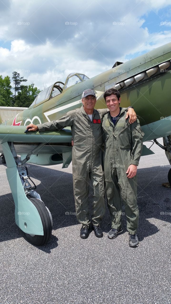 Flight. Former military airman about to take flight with his son