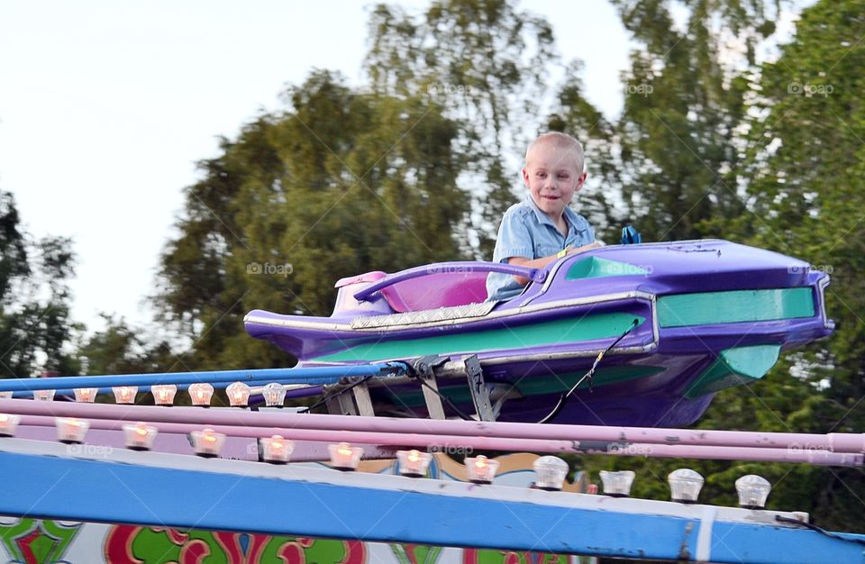 Boy in the carousel