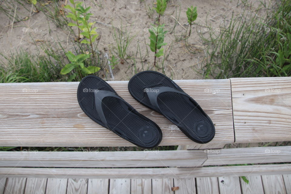 Totes sandals at beach
