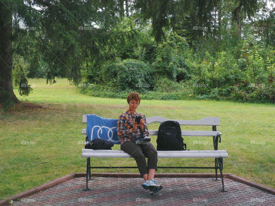 girl in the park on the bench