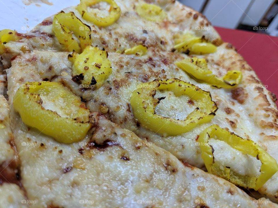 pizza with yellow chilly