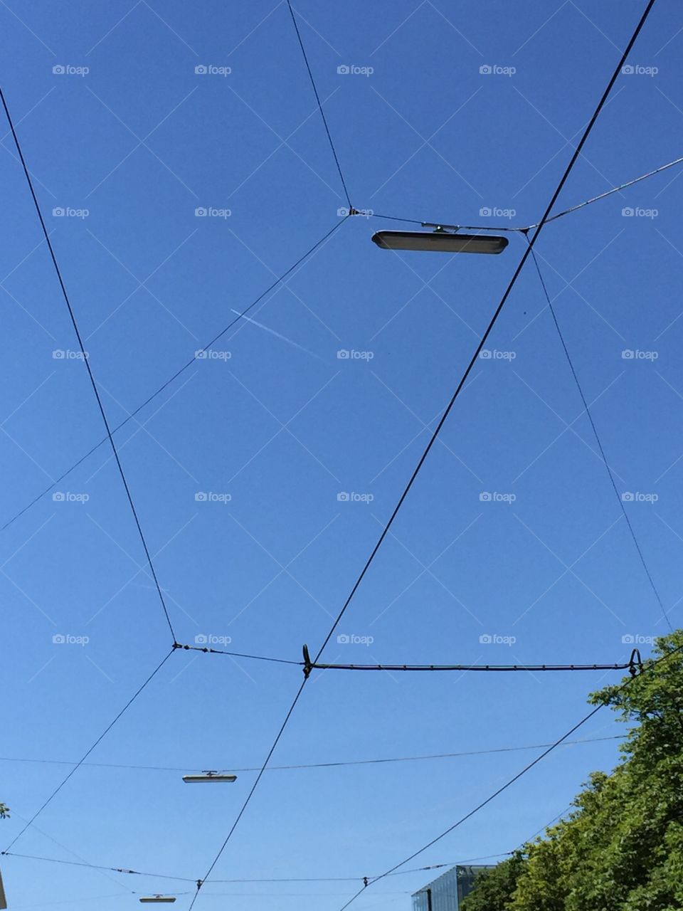 Electric wires in blue sky