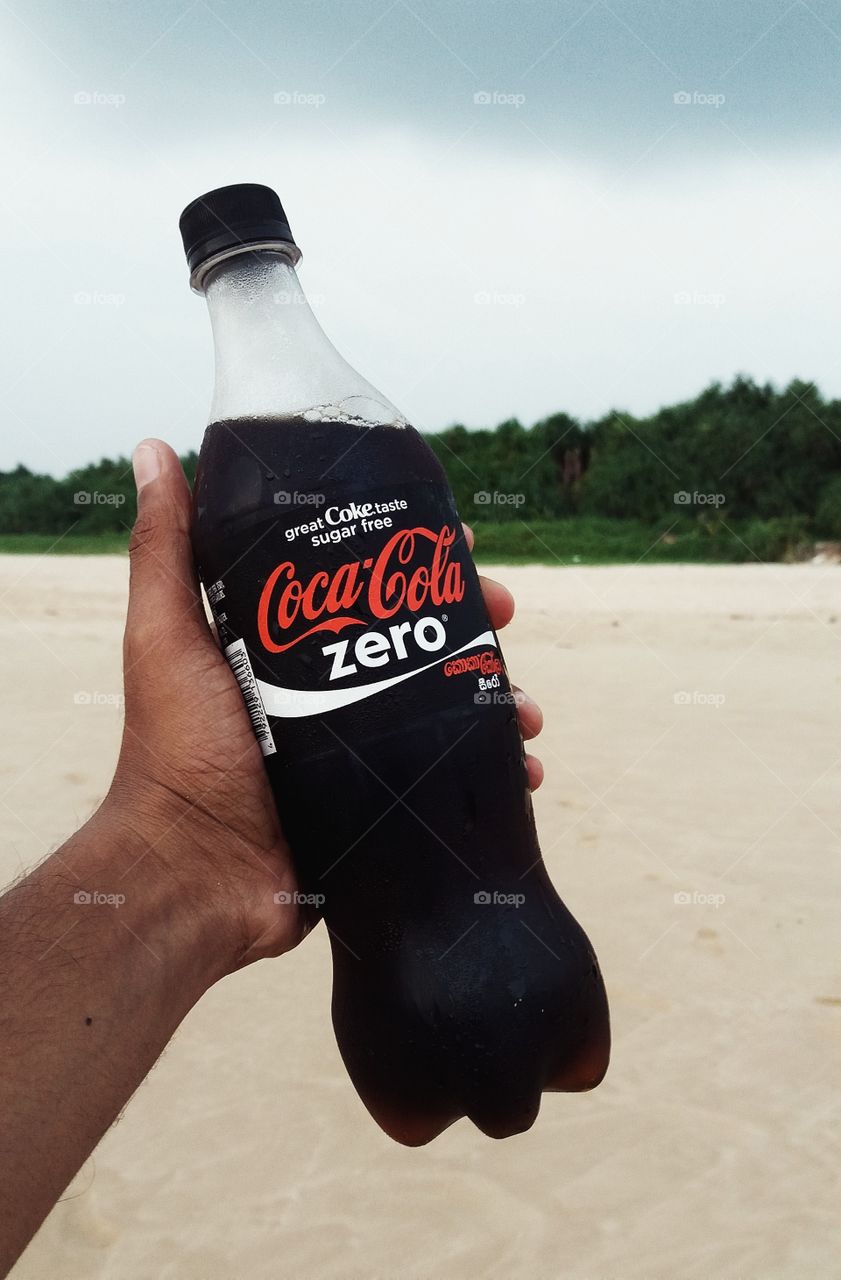 There is a funny story about this picture.   Once police fined me when i was ride the bike without the license. And then i went to the police station to pay the fine. At that moment suddenly thought to visit a famous beach called Koggala Beach in Sri Lanka. And then took this picture when i was hold a coca cola bottle on my hand. ❤📷✌