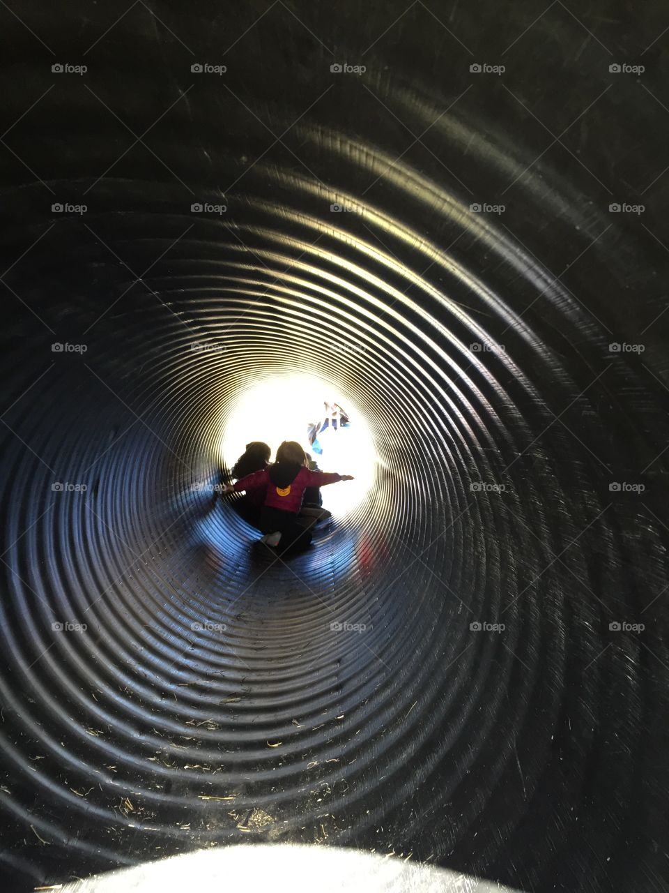 Kids in tunnel 