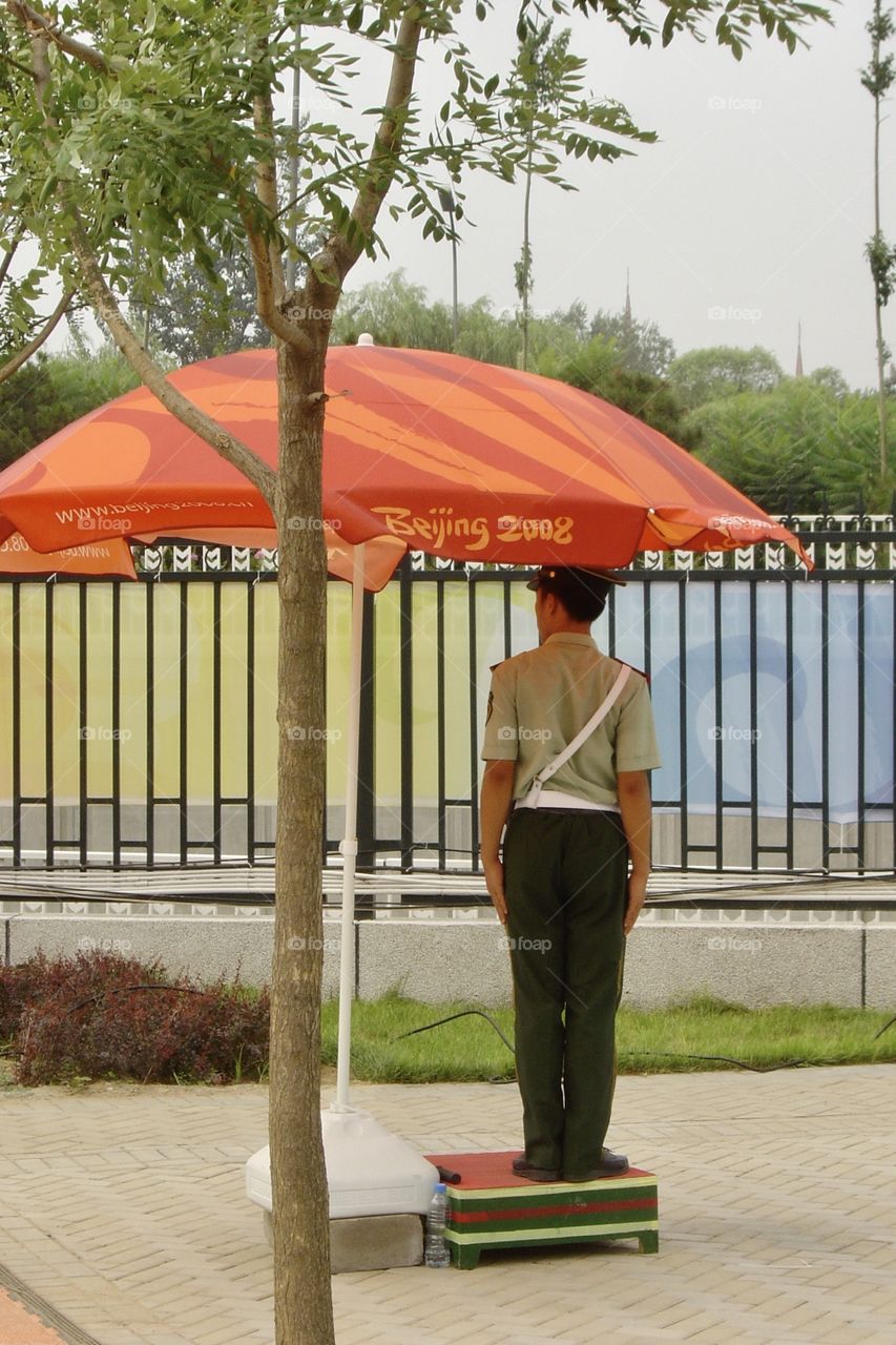 Soldier alongside the road cycling course at 2008 Olympic Games in Beijing, China 