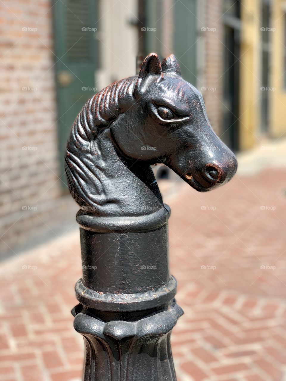 Horse head hitching post