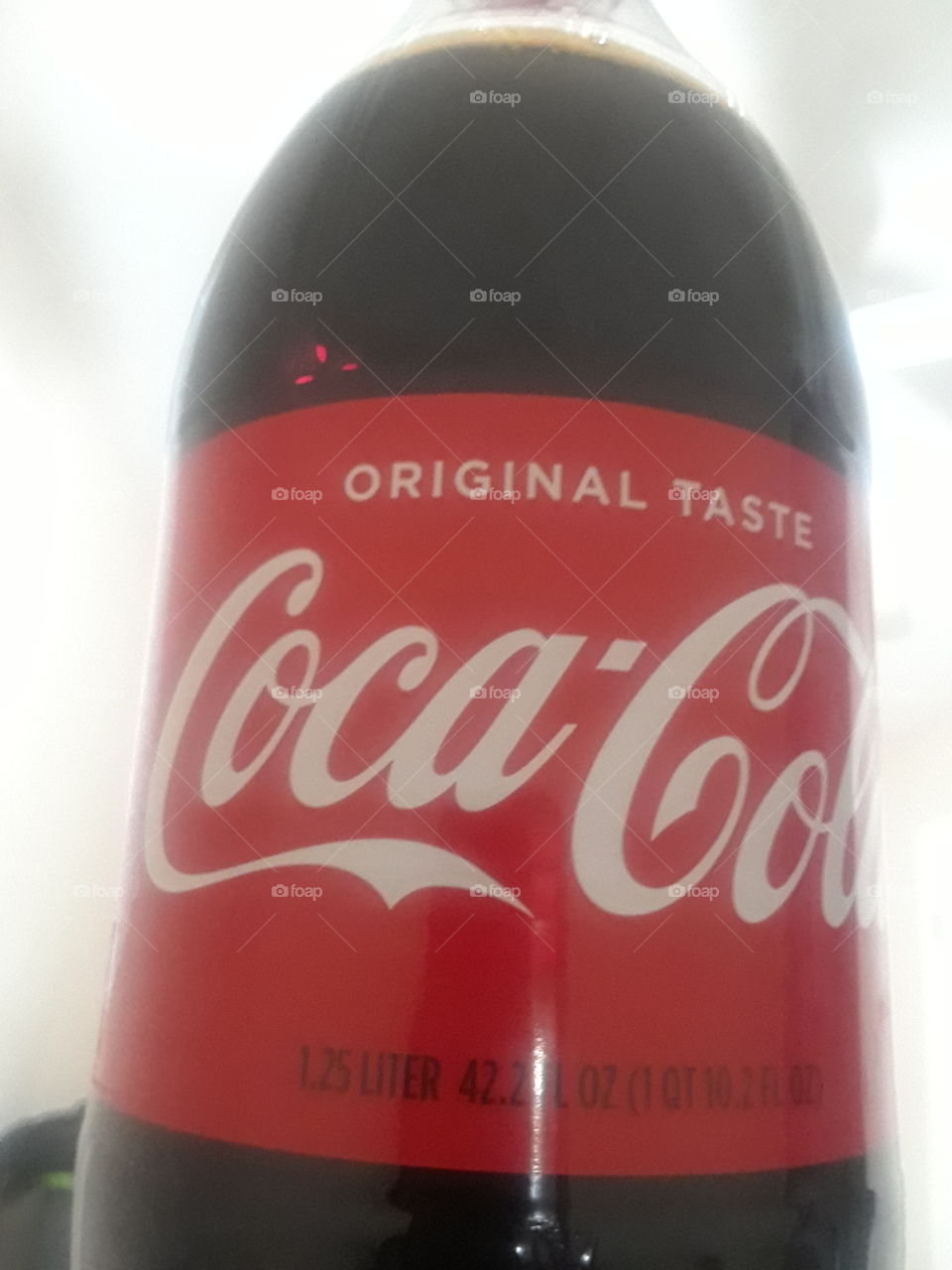 coca cola is a way of life.It taste good.It feels good.It is original taste.LOVE coca cola.Drink soda to make u happy.Blacl and Red color..