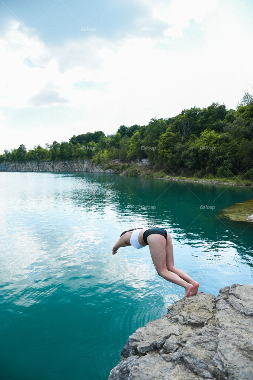 preparing to dive into water