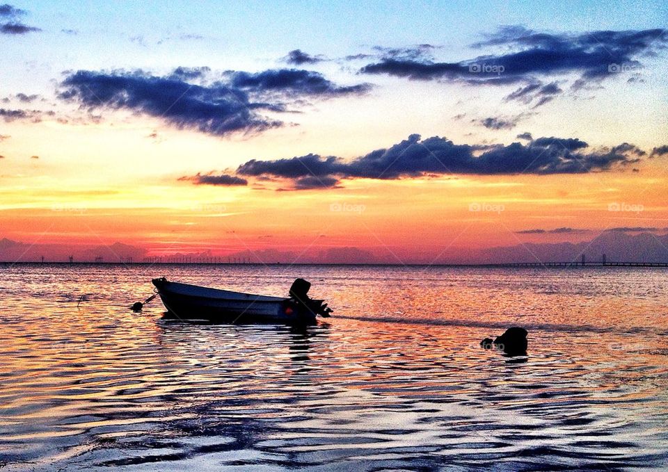 Silhouette of boat during sunset