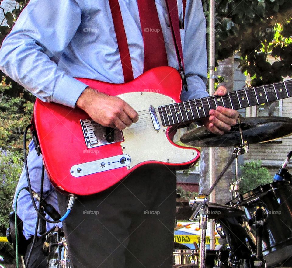 red musician guitar