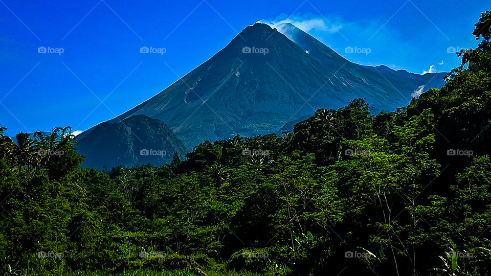 there is smoke outside the merapi volcano