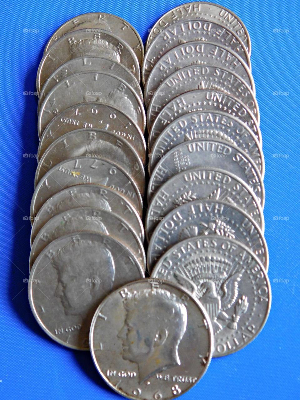 Silver round Kennedy Half Dollars - Geometry is a type of math that deals with points, lines, shapes, and surfaces.
Examples are Circles, Rectangles, and Triangles. A circle is a round-shaped figure that has no corners or edges
