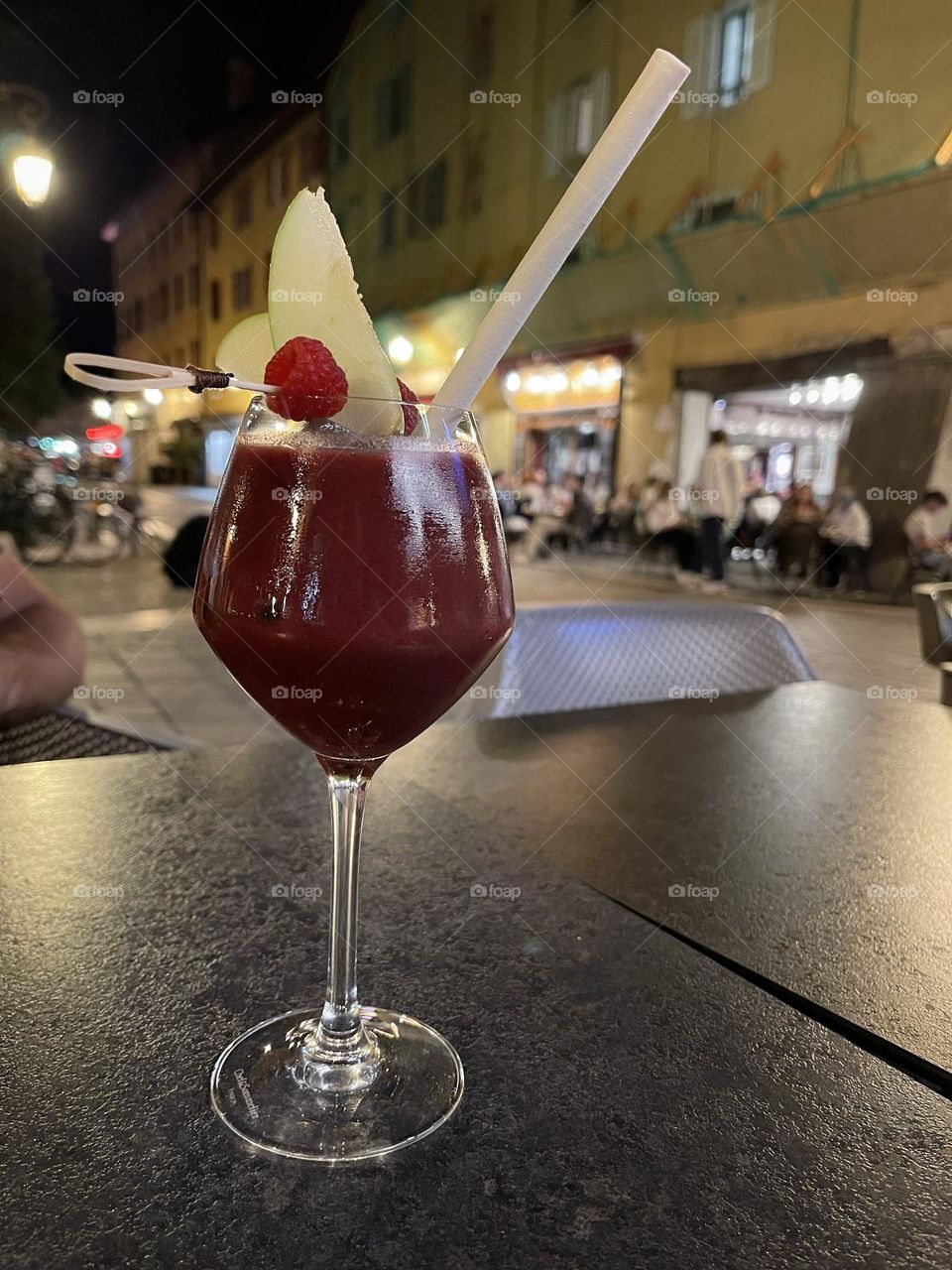 Fruit cocktail in a glass in a tabletop 